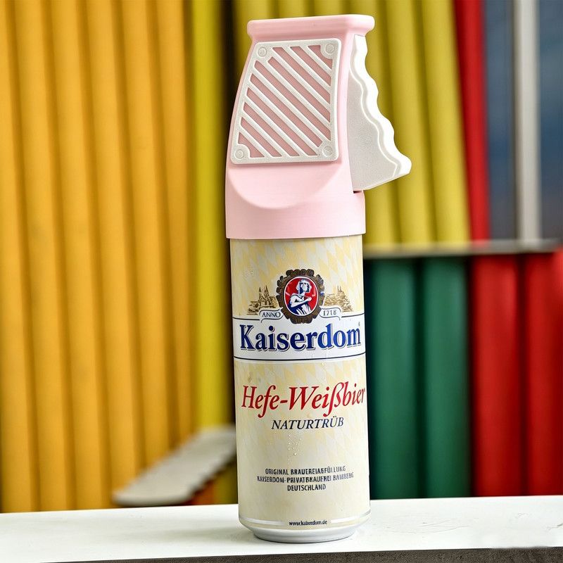 3D printed desktop ornament of a one-handed can opener, for beverages.Pink โ image 3