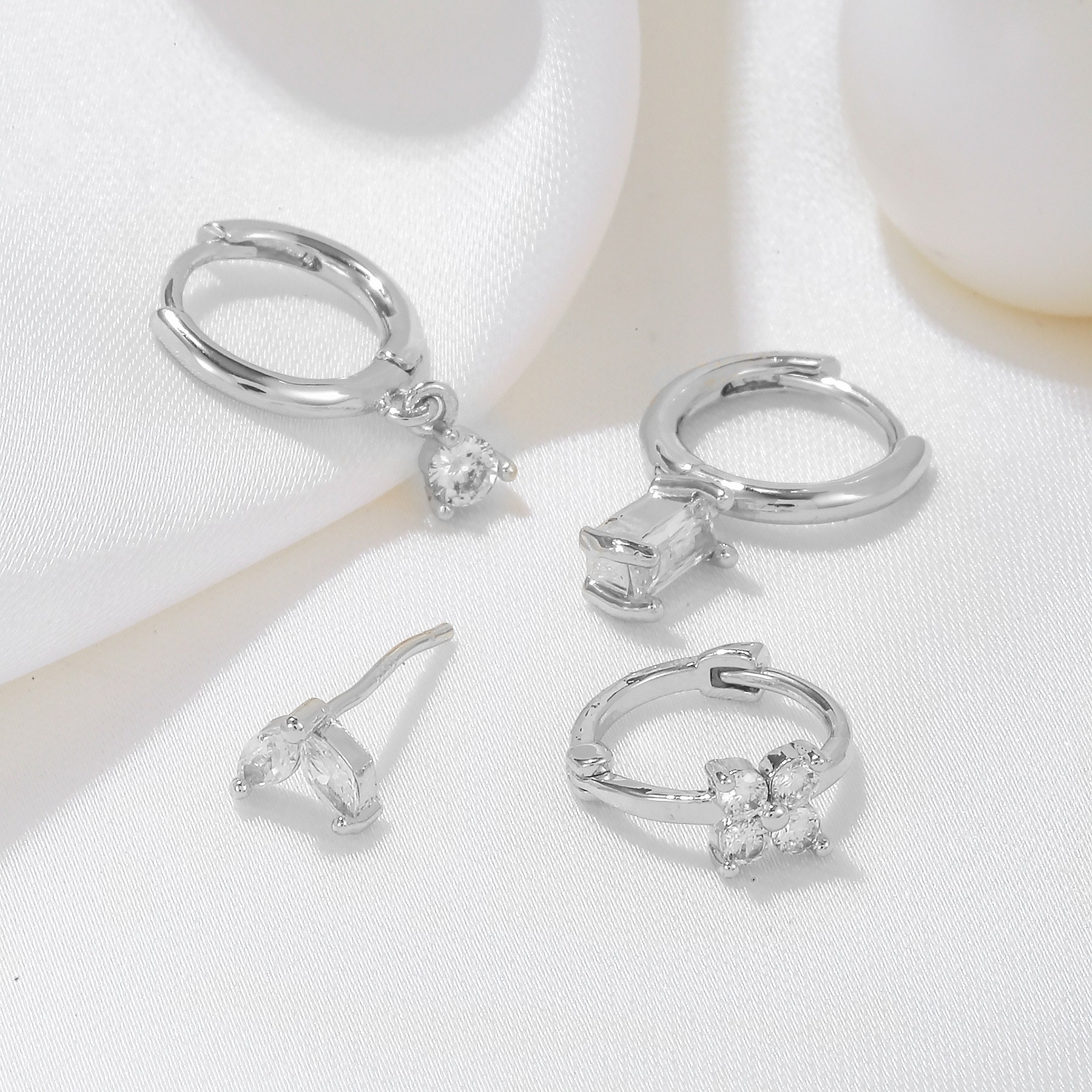 Four-piece set Gold Delicate CZ Earring Stacking Set - Huggie Hoops & Studs for Multiple Piercings — image 3