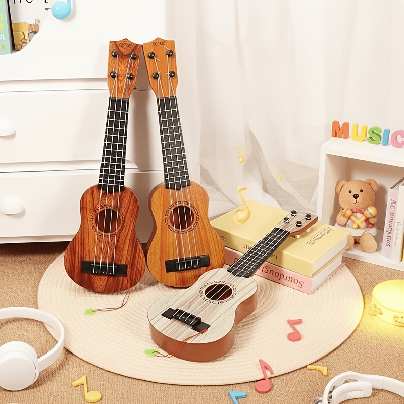 Wood color 17-inch Playable Ukulele Mini Guitar, lightweight and portable. Features comfortable nylon strings, includes a pick, and has open-style tuning pegs — image 5