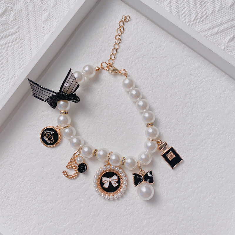 Black 4-PCS Pearl Charm Pet Necklace - Adjustable Bowknot Collar for Small Dogs & Cats (S: 20+5CM) — image 4