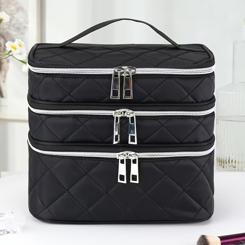 Fashionable and light luxury large-capacity black embroidered diamond-shaped cosmetic bag with three for multi-level storage, portable and hand-held, suitable