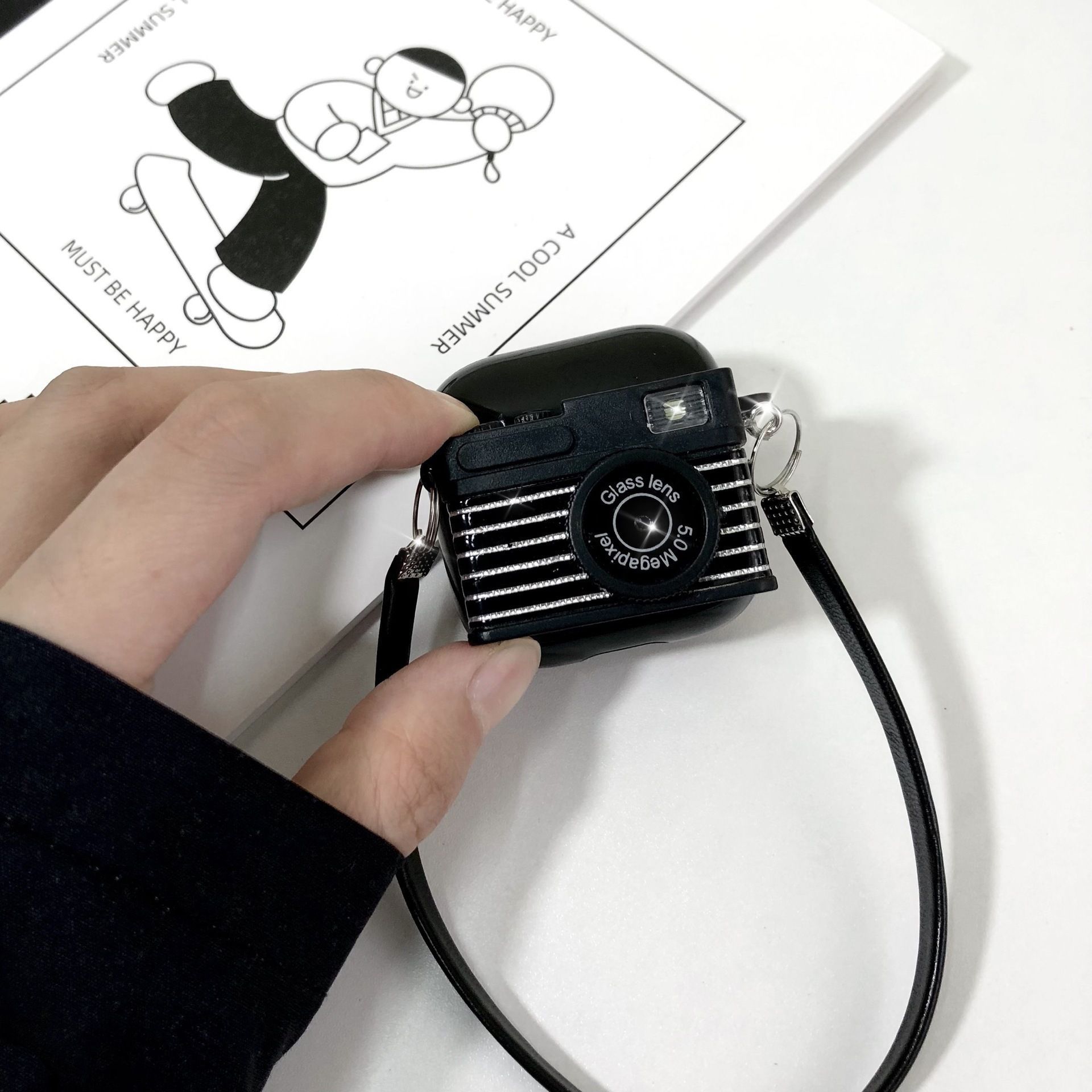 striped light-emitting and sound-making camera AirPods Pro 2