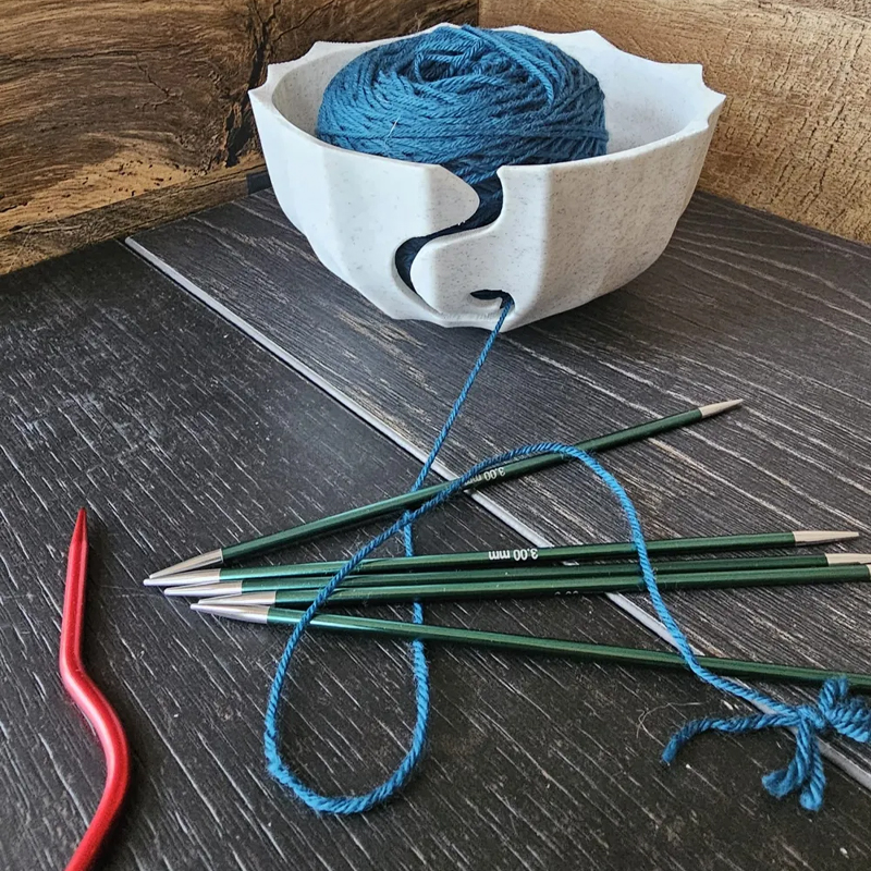 A 3D-printed yarn bowl to accompany your knitting and crochet time. White โ image 3