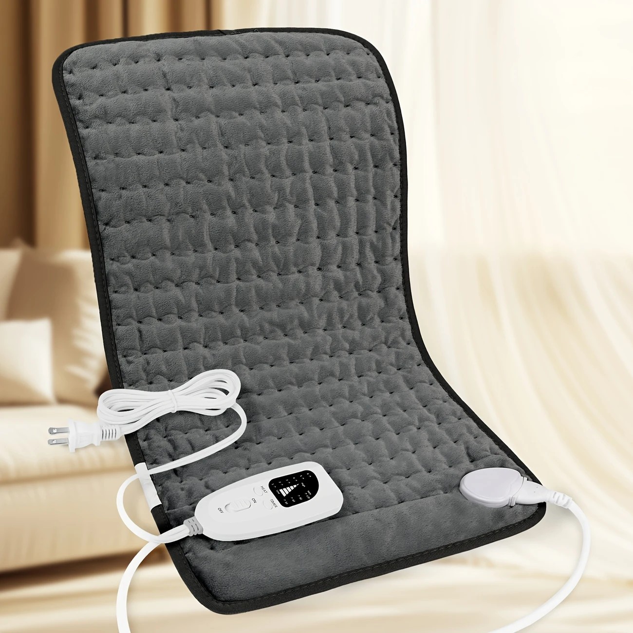 Dark grey This large heating pad (24" x 12") features 6 temperature levels and 4 timer settings, with rapid heating and auto-off functions. It is portable