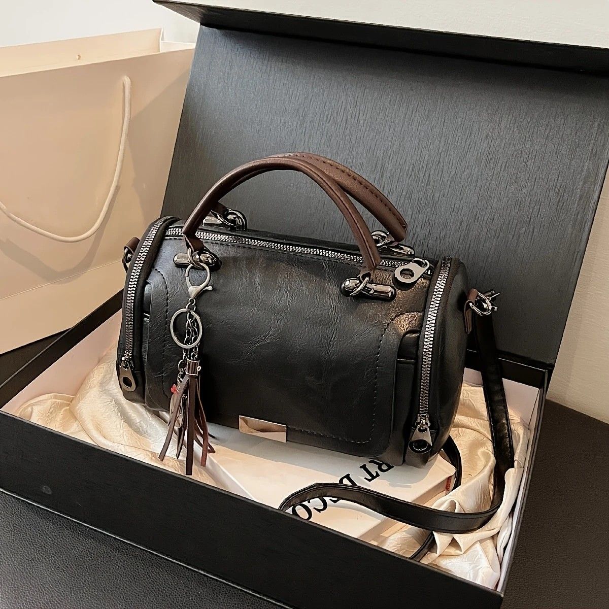 Vintage Tote Bag: Spacious multi-pocket design with tassel and metal accents, supports multiple carrying methods, combining practicality and style.black — image 6