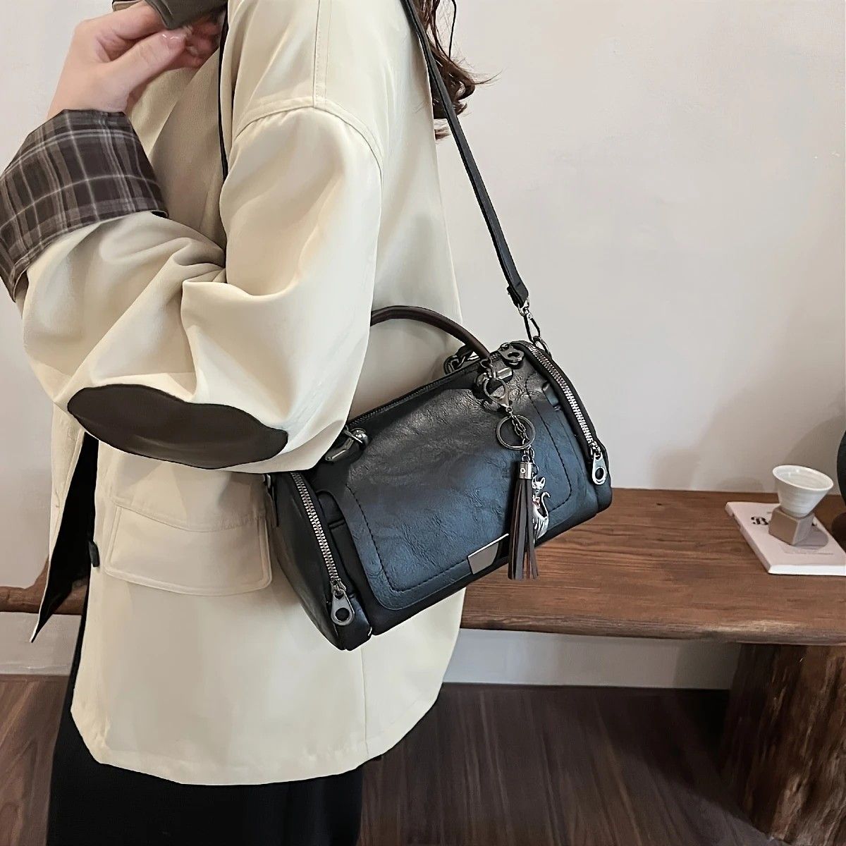 Vintage Tote Bag: Spacious multi-pocket design with tassel and metal accents, supports multiple carrying methods, combining practicality and style.black — image 3