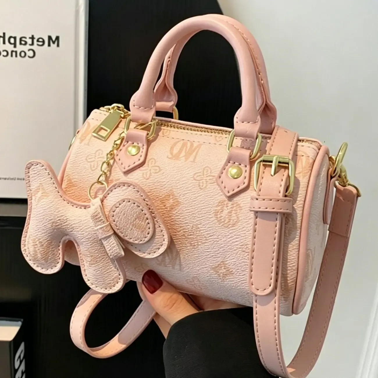 Classic Monogram Pillow Bag: Premium PU Leather with Luxe Feel, Cute Pet Charm for a Playful Touch, Compact Size Fits Phone, Multiple Carry Ways, Versatile for