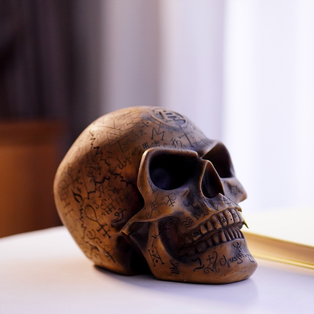 Mystic Runic Skull Statue with Gold Fang - Hand-Painted Resin Figurine for Gothic & Halloween Decor — image 2
