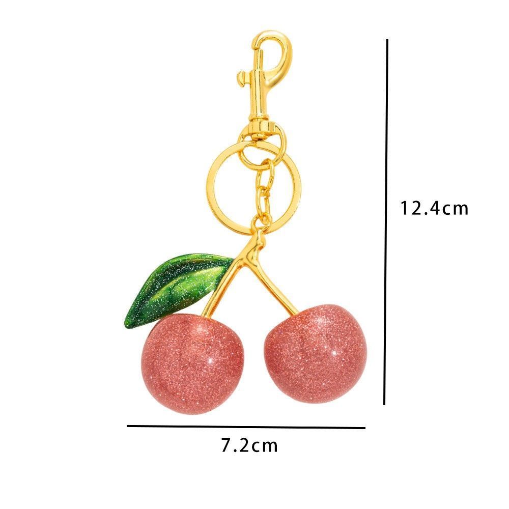 Petite Pink Cherry Keyring matched with a single green leaf, wrapping you in mild, quiet happiness each day — image 2