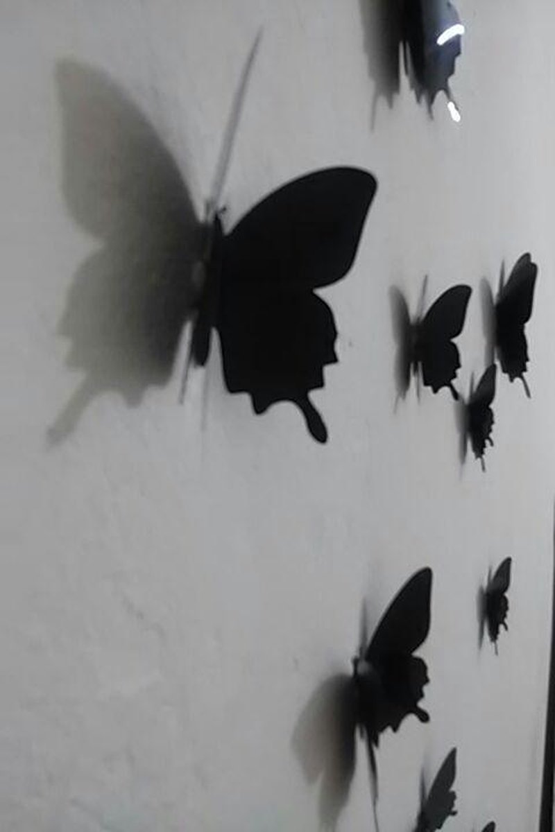 Solid black 3D butterflies — image 2