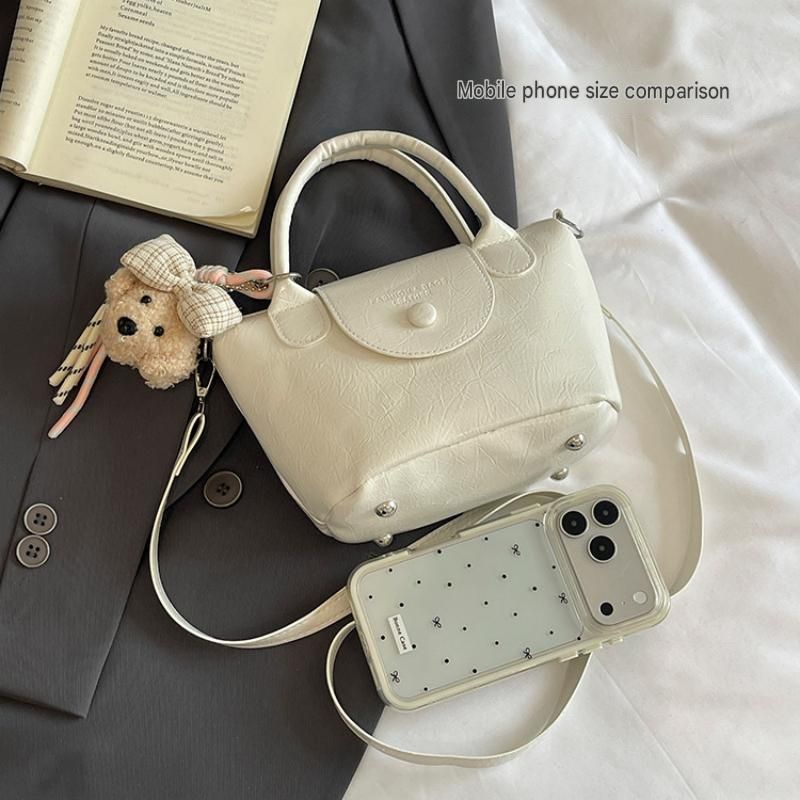 White Compact PU Leather Crossbody Bag With a pendant- Lightweight Handheld Shoulder Purse with Adjustable Strap, Zipper Closure and Metal Feet for — image 4