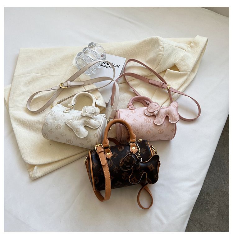 Classic Monogram Pillow Bag: Premium PU Leather with Luxe Feel, Cute Pet Charm for a Playful Touch, Compact Size Fits Phone, Multiple Carry Ways, Versatile for — image 4