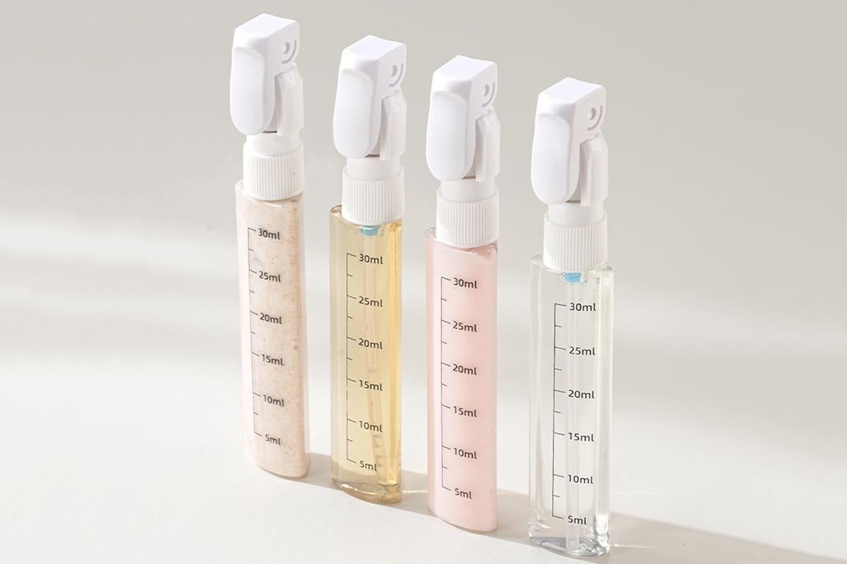 4 in 1 Travel Dispenser with 30ml Travel Bottles for Shampoo Lotion - White — image 3