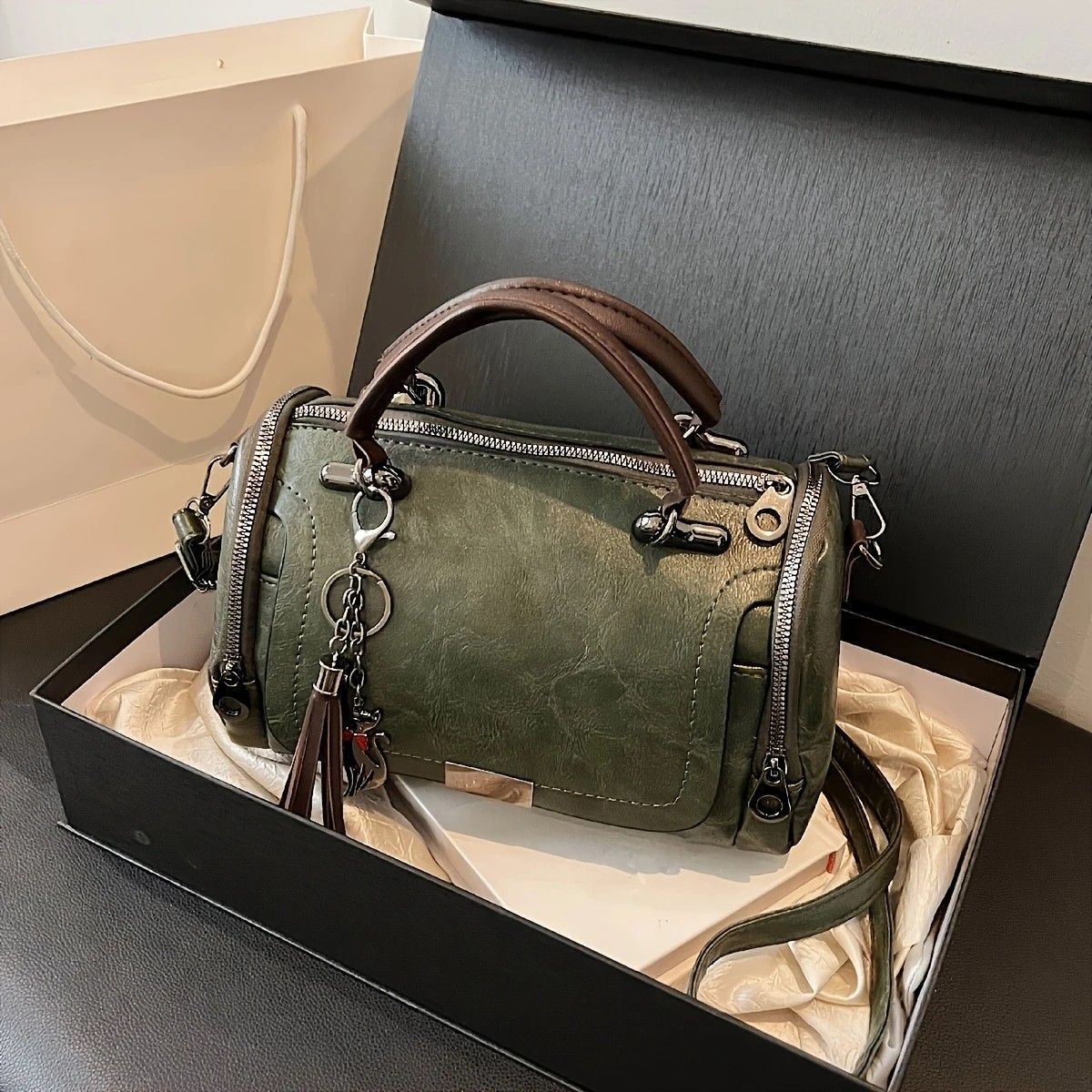 Vintage Tote Bag: Spacious multi-pocket design with tassel and metal accents, supports multiple carrying methods, combining practicality and style.GREEN