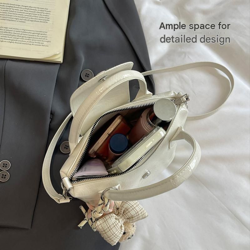White Compact PU Leather Crossbody Bag With a pendant- Lightweight Handheld Shoulder Purse with Adjustable Strap, Zipper Closure and Metal Feet for — image 5