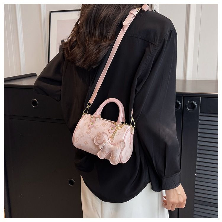 Classic Monogram Pillow Bag: Premium PU Leather with Luxe Feel, Cute Pet Charm for a Playful Touch, Compact Size Fits Phone, Multiple Carry Ways, Versatile for — image 2