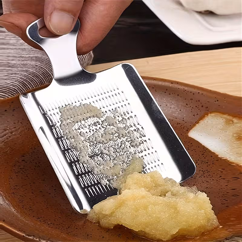 Compact Stainless Steel Grater, Mirror-Polished Grinder for Garlic, Ginger, Nutmeg, Wasabi and Chocolate — image 4