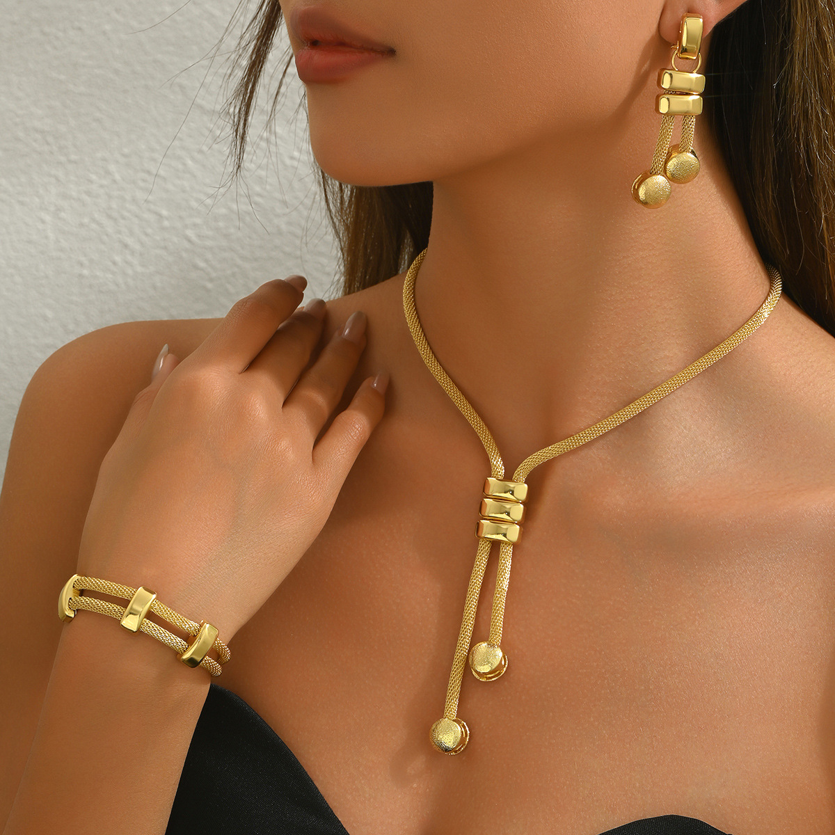New European-Style Women's Jewelry Set โ 18K Gold-Plated Long Necklace with Geometric Tassel Earrings and Matching Bracelet