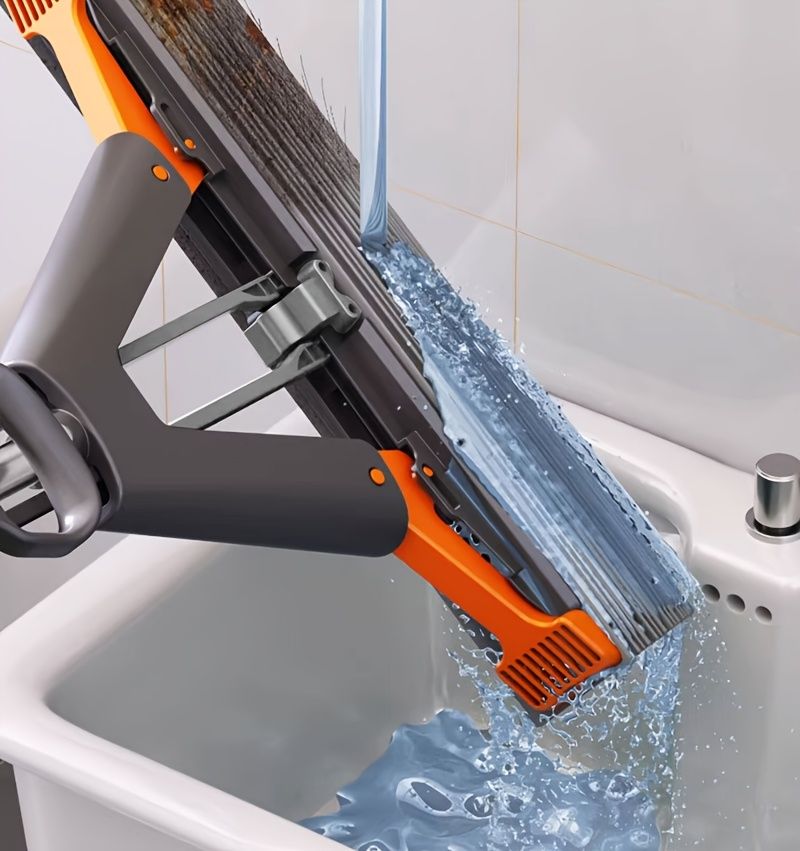 Black self-wringing sponge mop, Australian household mop, floor cleaning tool, comfortable mop, durable sponge mop, spill cleaning, timber floor mop