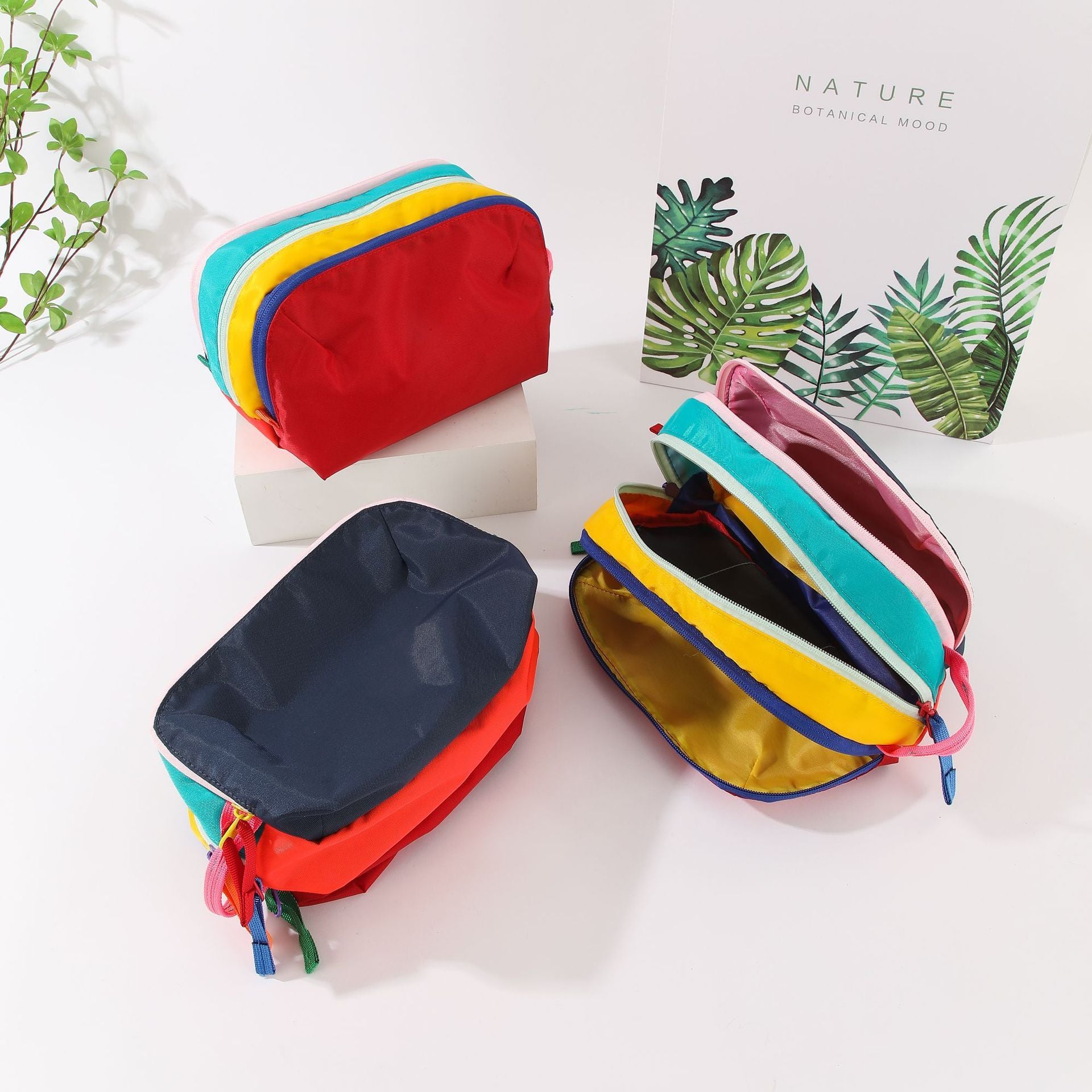 Dopamine Color-Blocking Cosmetic Bag, waterproof with large capacity, layered storage for skincare and makeup, easy opening and closing with drawstring zipper, essential sweet storage item for travel and commuting./(former) navy blue (later) scarlet
