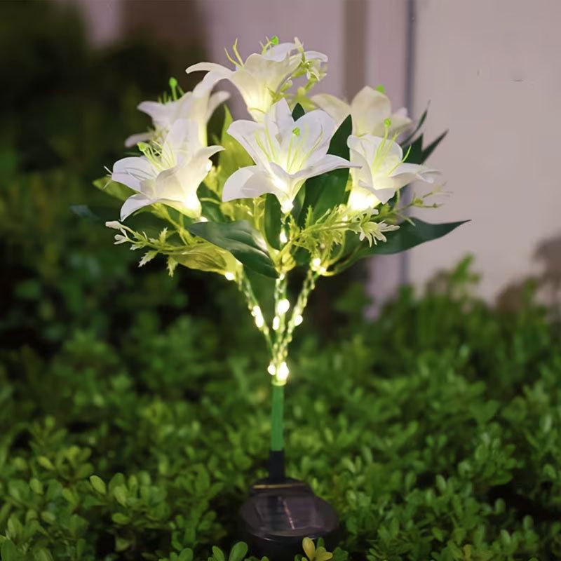 Seven Branch Solar Lily Light: Charges during the day, glows at night. Seven lilies bloom together, soft light flows like water through your garden./white