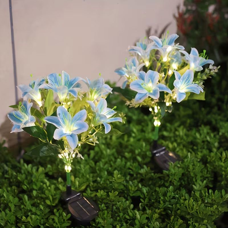Seven Branch Solar Lily Light: Charges during the day, glows at night. Seven lilies bloom together, soft light flows like water through your garden./white