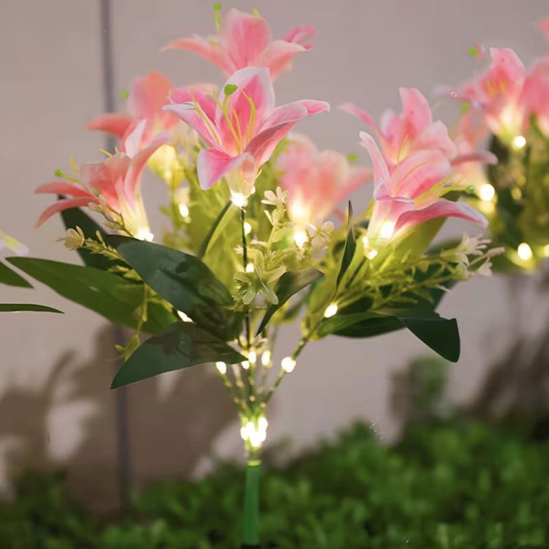 Seven Branch Solar Lily Light: Charges during the day, glows at night. Seven lilies bloom together, soft light flows like water through your garden./white