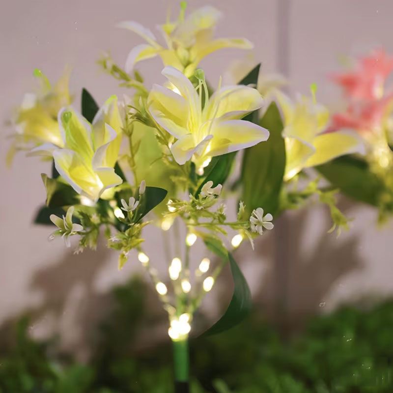 Seven Branch Solar Lily Light: Charges during the day, glows at night. Seven lilies bloom together, soft light flows like water through your garden./YELLOW